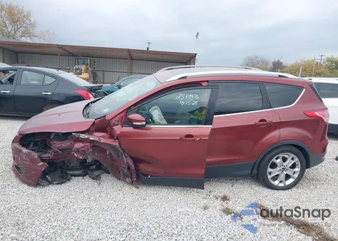 2016 Ford Escape Titanium z USA, uszkodzony, nr VIN 1FMCU9JX2GUB55472